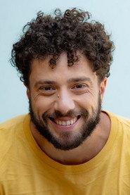 Adriano Tunes as Samuel Reoli in Mamonas Assassinas: The Movie 2023