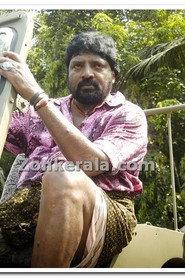 Vimal Raj as Deva Narayana Moorthy in Sravu 2001