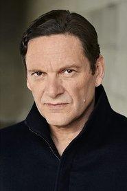 Andrew Kavadas as Doug Harvey in Mr. Hockey: The Gordie Howe Story 2013