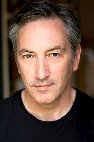 Phil Peleton as Crosby/Textor (voice)/ Crosby/Textor Focus Group Leader in The Hollow Men 2008