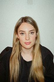 Aimee Armstrong as Bella in DOLLS: PART ONE 