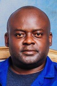Roy Chisha as Uncle Fred in On Becoming a Guinea Fowl 2024