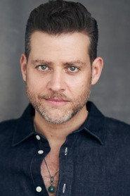 Daniel Robaire as John in Emmageddon 2020
