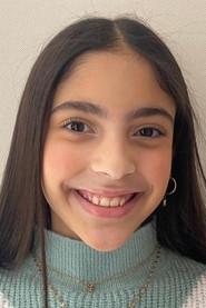 Antonella García Cañas as Lucía (Niña) in A Desired Day 2024