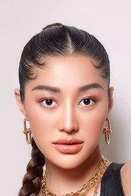 Praiya Padungsuk as Aim in Black Magic Mask 2023