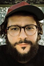 Jon Beaton as the documentary filmmaker in Field Reports 2026