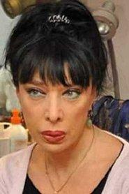 Marina Kakhiani as Secrétaire à la tête rasée in A Chef in Love 1996