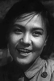 Liu Yuru as 王兰 in Battle on Shangganling Mountain 1956