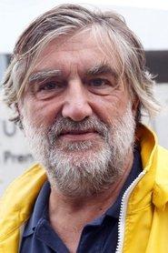 Pierre-Ange Le Pogam as Le Directeur du Dépôt in Not For, or Against (Quite the Contrary) 2003
