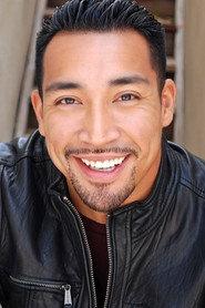 Joe Corzo as Officer Katinski in Abduction Runs in the Family 2022