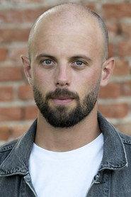 Luca Fontaine as Burns in Lords of War 2027