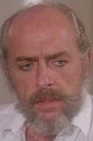 Jake Teague as Inspector Logan in Eaten Alive! 1980