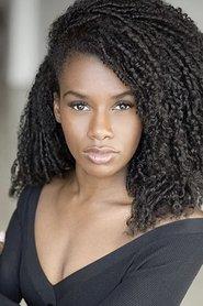 Jasmine Renée Thomas as Kelly in Falling in Love at Christmas 2021