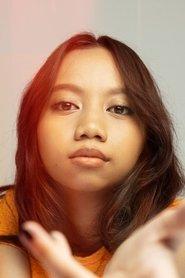 Deena Ezral as Farah in Tiger Stripes 2023