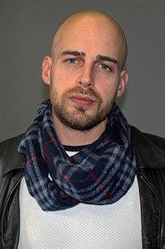 Alex Anlos as Nathan Terry in Planet of the Sharks 2016