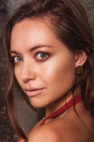 Amber Grayson as Reporter in The Last Butterflies 2023