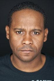 Norm Johnson as Inmate Librarian Ade Akionla in America; I Too 2017