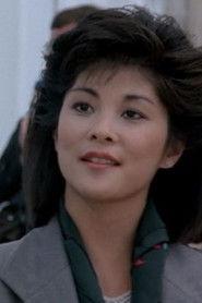 Jan Gan Boyd as Sally Cheng in Harry's Hong Kong 1987