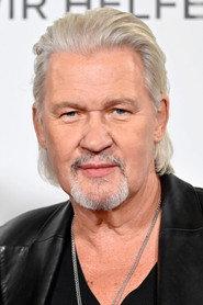 Johnny Logan as Self in Nul Points?! 1992