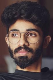 Anand Menen as Nimmy's Boy Friend in Gauthamante Radham 2020