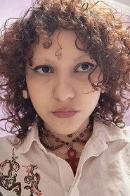 Syd Elliot as Ícelos in Muse's Kiss 2025
