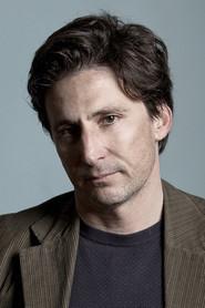 Dimitris Tarlow as Efklis in Adults in the Room 2019