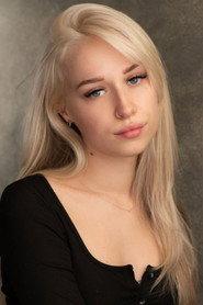 Ellie Medlock as Bella in Magenta House 2026