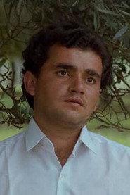 Hossein Rezai as Hossein in Through the Olive Trees 1994