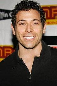 Greg Lindsay as TV Personality / Red Dog / Rex (voice) in A Cat's Tale 2008