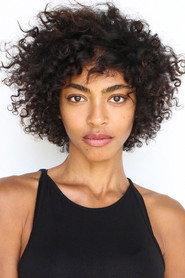 Jessi M'Bengue as Malika in A Meeting of the Minds 2016
