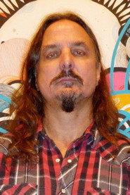 Thomas R. Peters Jr. as Beat book shop proprietor in American Saint 2001