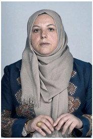 Fatima Smadi as Self - Interviewee / Journalist in HALEMEH 2003