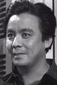 Kristopher Kum as The Interrogator in The Switch 1971