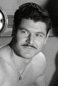 Gino Turini as Dra in The Beast in Heat 1977