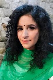 Meenu Mishra as Ishani Sharma in The Dead 2: India 2013
