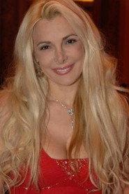 Alessandra Canale as Gianna, assistente di Gabriele in Young, Beautiful... Probably Rich 1982