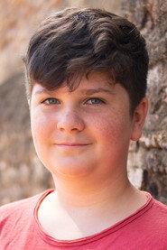 Gabriele Cristini as Young Carezza in ...Watch Out, We're Mad 2022