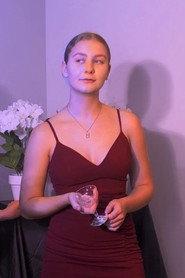 Logan Morris as Amelia in The Night We Should've Left Behind 