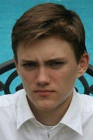 Edward Mitchell as Ewan in Paranormal Investigators 2022