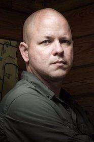 John Ceallach as Warrant Officer Hunton in Sniper: Deadliest Missions 2010
