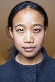Visra Vichit-Vadakan as Ann in By the Time It Gets Dark 2016