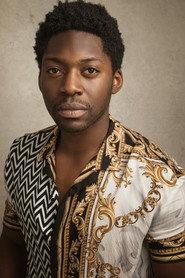 Natey Jones as Travis in Pretty Red Dress 2023
