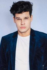 Ruy Brissac as Dinho in Mamonas Assassinas: The Movie 2023