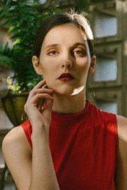 Nidia Casís as Clara in El peso 2009