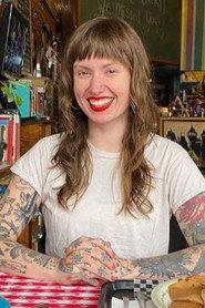 Meg Tuey as Self in meanwhile in seattle... 2022