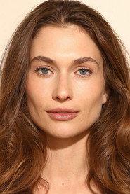 Arina Polonskaya as secretary in Happy When You're Not 2026