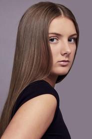 Ashley Reese Carley as Alex Bennett in What We Carry With Us 2025