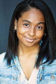 Laila Pruitt as Young Deja in Rolling Into Christmas 2022