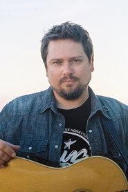 Sean Watkins as (archive footage) in How to Grow a Band 2012