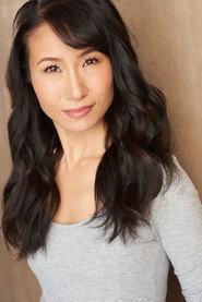 Rumi Oyama as Miss Hanabusa in Running for Grace 2018